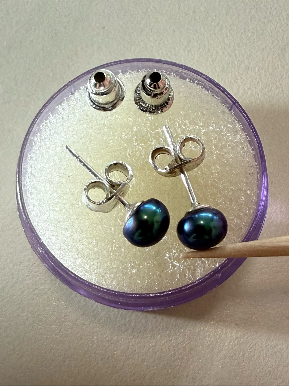 Genuine iridescent Peacock Pearls on Hypoallergenic Stainless Steel,2 backs.